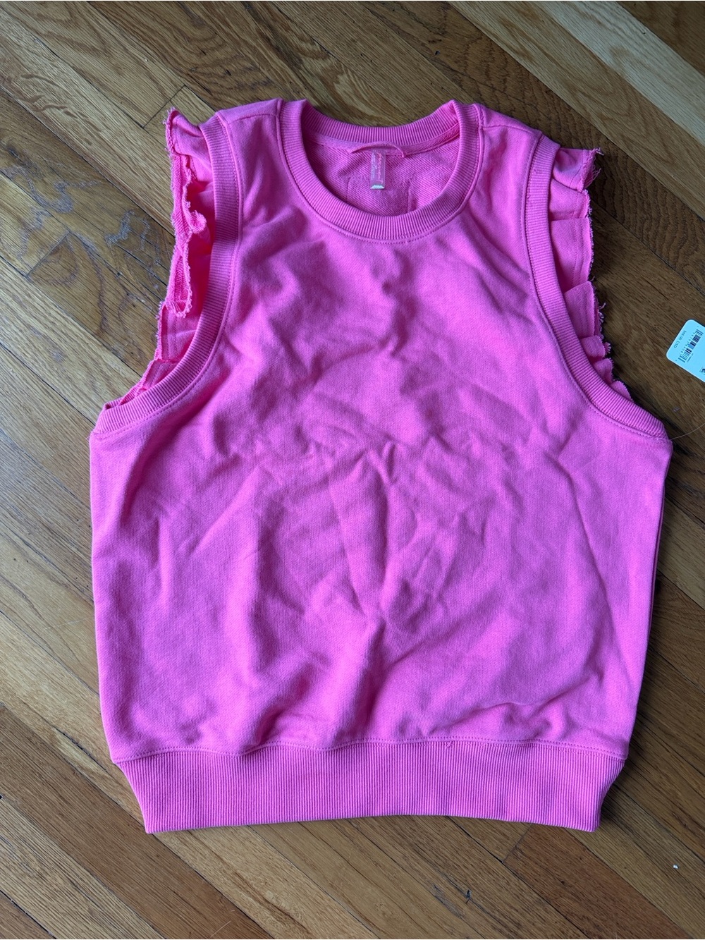 NWT size S free people movement flutter tank in pink.